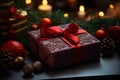 christmas presents on a table with candles and ornaments Royalty Free Stock Photo