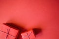 Christmas presents wrapped red paper. New Year flat lay top view background