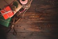 Christmas presents wrapping over wooden table background