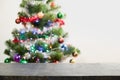Christmas product background with blurred fir tree.