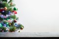 Christmas product background with blurred fir tree.