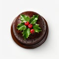 Christmas Pudding With a Sprig Of Holly Isolated On A White Background. Royalty Free Stock Photo