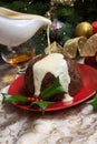 Christmas Pudding With White Sauce Royalty Free Stock Photo