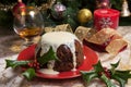 Christmas Pudding With White Sauce Royalty Free Stock Photo