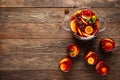 Christmas punch. Festive red cocktail, drink with cranberries and citrus fruits in a punch bowl and glasses Royalty Free Stock Photo