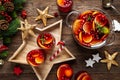 Christmas punch. Festive red hot toddy cocktail, drink with cranberries and citrus fruits