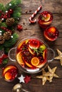 Christmas punch. Festive red hot toddy cocktail, drink with cranberries and citrus fruits Royalty Free Stock Photo