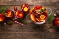 Christmas punch. Festive red hot toddy cocktail, drink with cranberries and citrus fruits Royalty Free Stock Photo