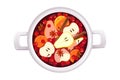 Christmas punch, mulled wine with pear, apples, orange and cranberries in a saucepan.Winter hot drink.