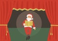 Christmas puppet theater. Santa reads Xmas story