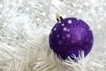 Christmas purple ball on white needless