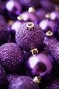 Christmas purple baubles close up. Abstract holiday decor background Royalty Free Stock Photo