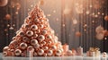 Christmas pyramid made of many peach-colored balls with boxes for gifts, banner, copy space