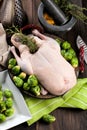 Christmas raw duck served on a kitchen table Royalty Free Stock Photo