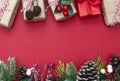 Christmas red background with surprise gift boxes and copy space. Winter holidays with presents, top view, flat lay Royalty Free Stock Photo