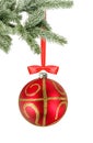 Christmas red ball and christmas tree branch isolated over white Royalty Free Stock Photo