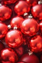 Christmas red baubles close up. Abstract holiday decor background Royalty Free Stock Photo