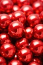 Christmas red baubles close up. Abstract holiday decor background Royalty Free Stock Photo