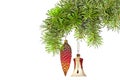 Christmas red cones and bell on new year tree Royalty Free Stock Photo