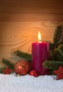 Christmas red decoration and Advent candle. Christmas card. Royalty Free Stock Photo