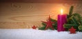 Christmas red decoration and Advent candle. Christmas card. Royalty Free Stock Photo