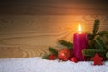 Christmas red decoration and Advent candle. Christmas card. Royalty Free Stock Photo