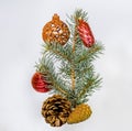 Christmas red decorations ball with fir tree and pine cone. New years vintage country style card Royalty Free Stock Photo