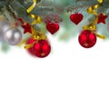 Christmas red decorations hanging on fir tree Royalty Free Stock Photo