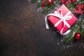 Christmas red present box on dark background. Royalty Free Stock Photo