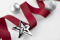 Christmas red ribbon decorate with silver glitter ornament balls Royalty Free Stock Photo