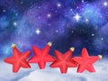 Christmas red star decorations with night sky Royalty Free Stock Photo