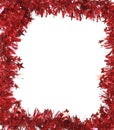 Christmas red tinsel as frame. Royalty Free Stock Photo
