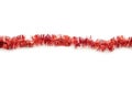 Christmas red tinsel isolated on white background Royalty Free Stock Photo