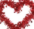 Christmas red tinsel with stars as heart. Royalty Free Stock Photo