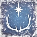 Christmas Reindeer Antlers with Star on Grunge Blue Background Royalty Free Stock Photo