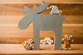 Christmas reindeer with gingerbread decoration - fish, tree aka snowman and bear Royalty Free Stock Photo