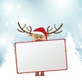 Christmas reindeer holding blank sign Royalty Free Stock Photo