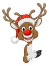 Christmas Reindeer in Santa Hat Cartoon Character Royalty Free Stock Photo