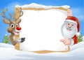 Christmas Reindeer and Santa Sign Royalty Free Stock Photo