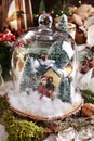 Christmas retro decoration with winter scene in glass dome Royalty Free Stock Photo