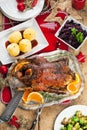 Christmas roast duck served on a festive table Royalty Free Stock Photo