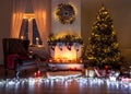 Beautiful decorated living room with a christmas tree and a fire place Royalty Free Stock Photo