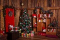 Christmas Room Interior Design, Xmas Tree Decorated By Lights, Presents, Gifts, Toys, Candles And Garland Lighting Royalty Free Stock Photo