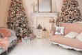 Christmas room interior home. Stylish interior of living room with Christmas tree and lights glowing garlands. Cozy decorated room Royalty Free Stock Photo
