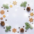 Christmas round frame with golden ornaments, painted snowflakes, pine cones, confetti on grey background, copy space Royalty Free Stock Photo