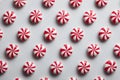 Christmas-Rows of red and white peppermint candies create a festive and sweet background Royalty Free Stock Photo