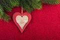 Christmas Rustic Decoration on Red Knitted Background Royalty Free Stock Photo