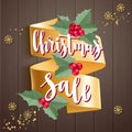 Christmas Sale. Christmas card with calligraphy, gold ribbon and decorative elements. Royalty Free Stock Photo