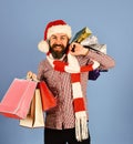 Christmas sale and discounts concept. Guy or hipster shopper Royalty Free Stock Photo