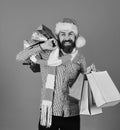 Christmas sale and discounts concept. Guy or hipster shopper Royalty Free Stock Photo
